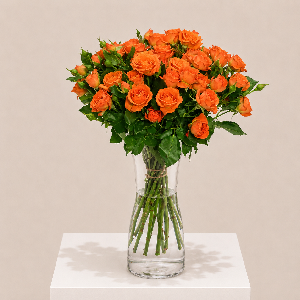 Luxury Orange Spray Roses Arrangement in Elegant Clear Glass Vase | Flori Mart Qatar 2