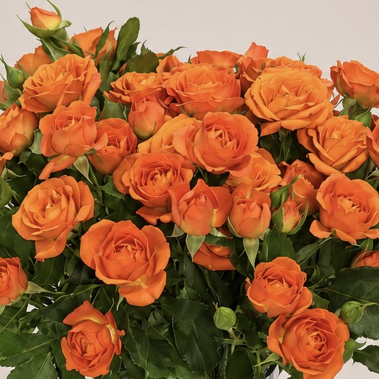 Luxury Orange Spray Roses Arrangement in Elegant Heart-Shaped Ribbed Glass Vase | Flori Mart Qatar 6