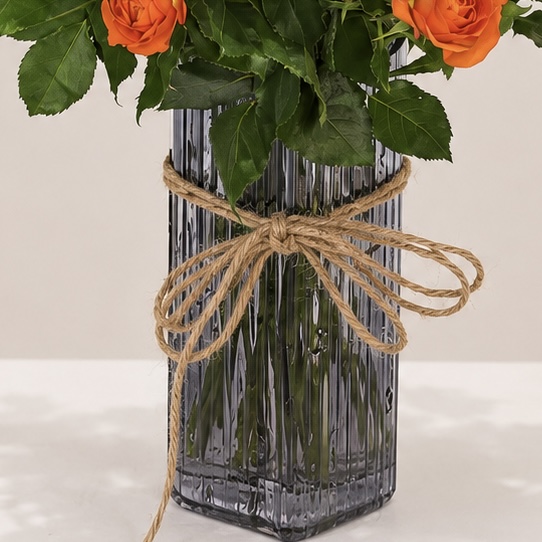 Luxury Orange Spray Roses Arrangement in Elegant Heart-Shaped Ribbed Glass Vase | Flori Mart Qatar 4