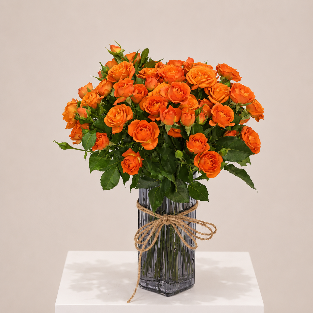 Luxury Orange Spray Roses Arrangement in Elegant Heart-Shaped Ribbed Glass Vase | Flori Mart Qatar 2