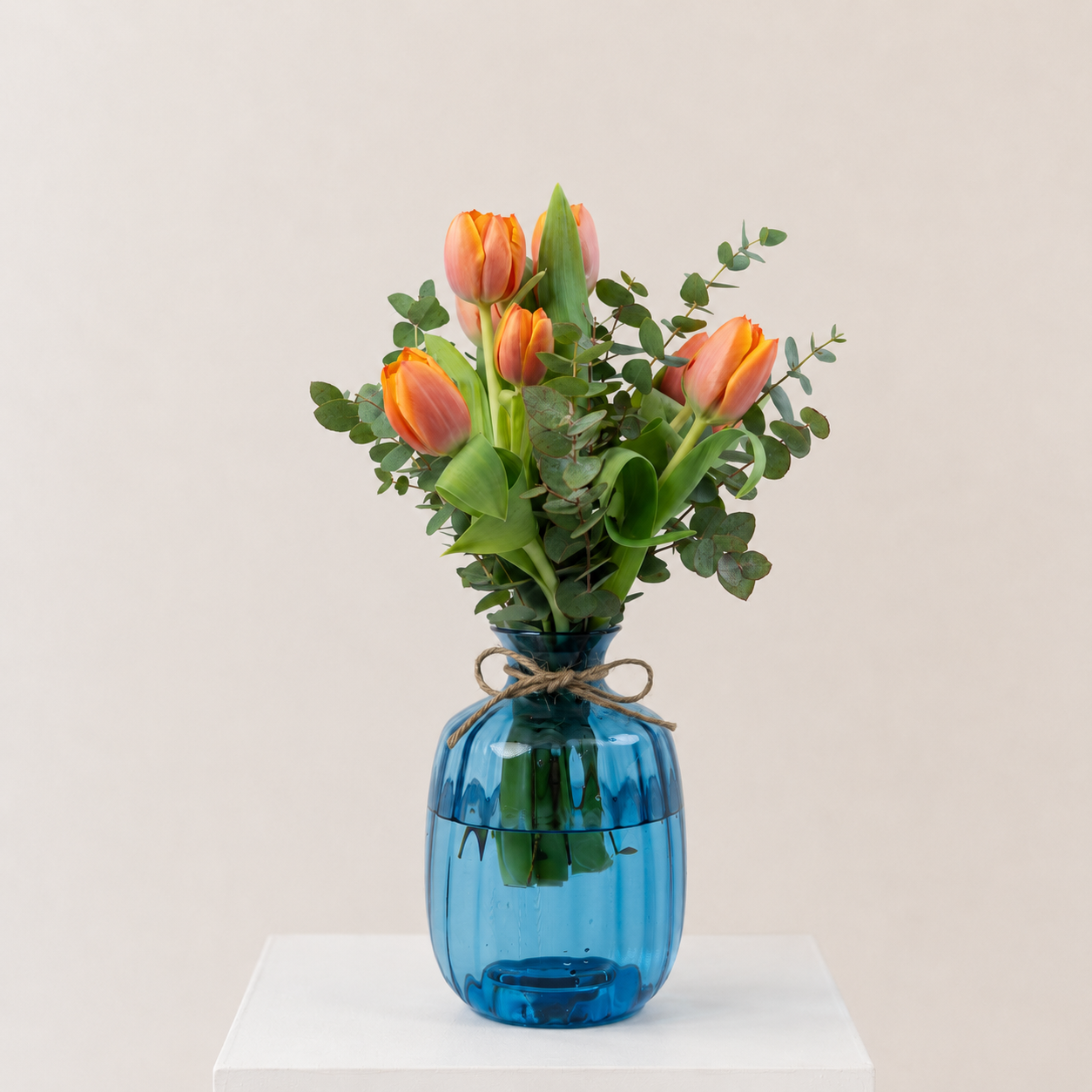 Luxury Orange Tulip Arrangement with Eucalyptus in Blue Glass Vase | Elegant Floral Gift
