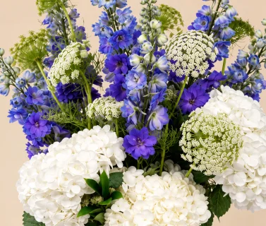 White Hydrangea & Blue Delphinium in Clear Glass Vase 4