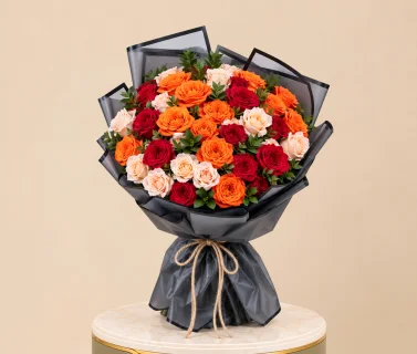 Red, Orange & Peach Rose Bouquet with Black Wrap 1